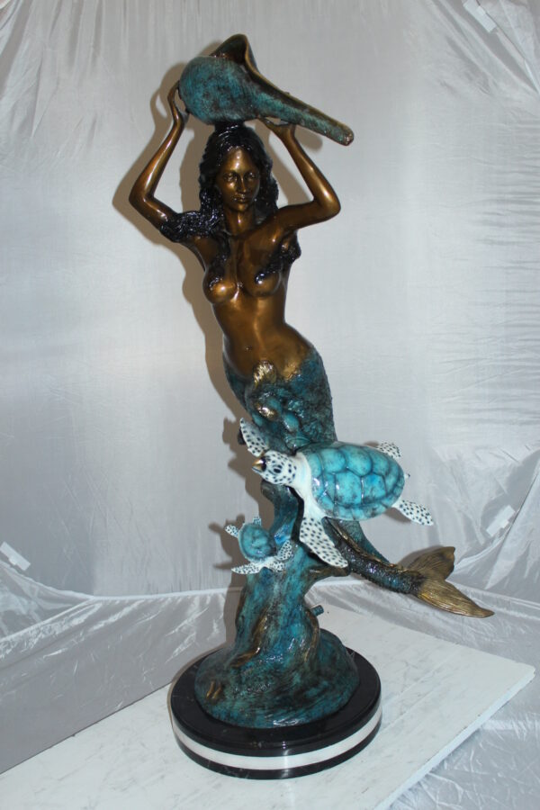 Mermaid 43 holding a shell fountain Bronze Statue -  Size: 14"L x 24"W x 43"H.