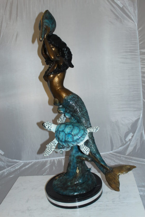 Mermaid 43 holding a shell fountain Bronze Statue -  Size: 14"L x 24"W x 43"H.