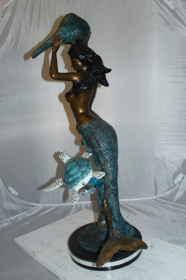 Mermaid 43 holding a shell fountain Bronze Statue -  Size: 14"L x 24"W x 43"H.