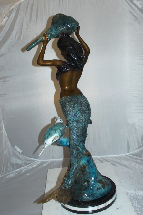 Mermaid 43 holding a shell fountain Bronze Statue -  Size: 14"L x 24"W x 43"H.