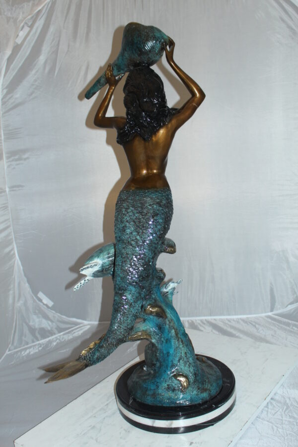 Mermaid 43 holding a shell fountain Bronze Statue -  Size: 14"L x 24"W x 43"H.