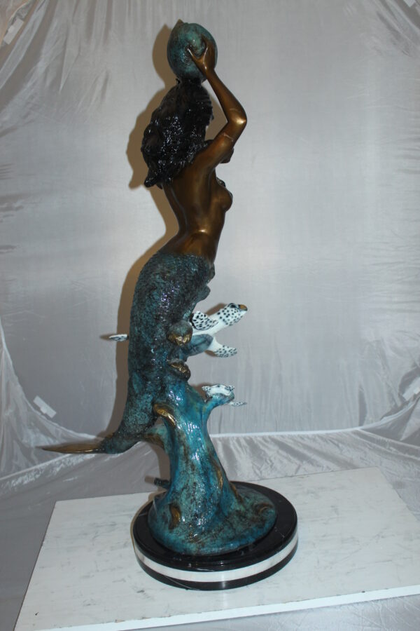 Mermaid 43 holding a shell fountain Bronze Statue -  Size: 14"L x 24"W x 43"H.