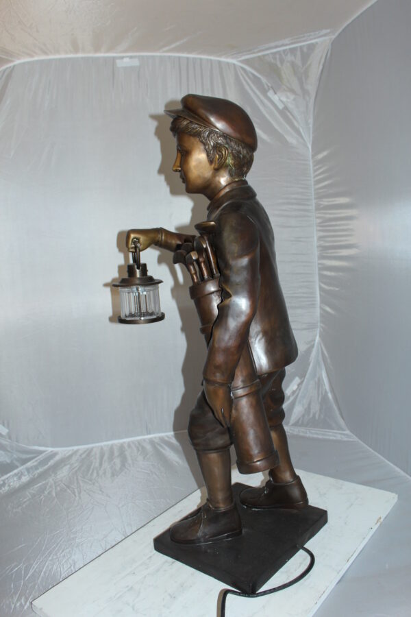 Caddy with light Bronze Statue -  Size: 19"L x 19"W x 42"H.