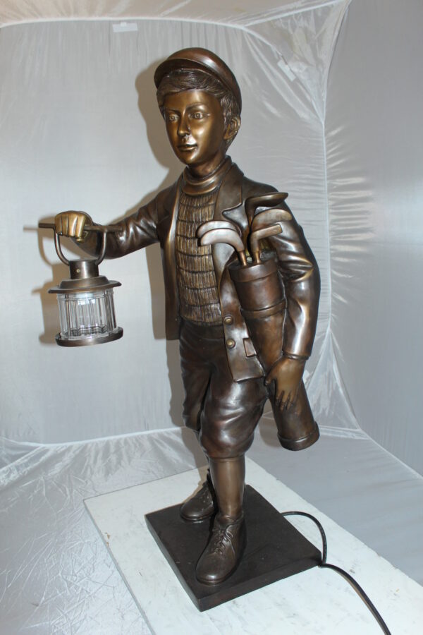 Caddy with light Bronze Statue -  Size: 19"L x 19"W x 42"H.