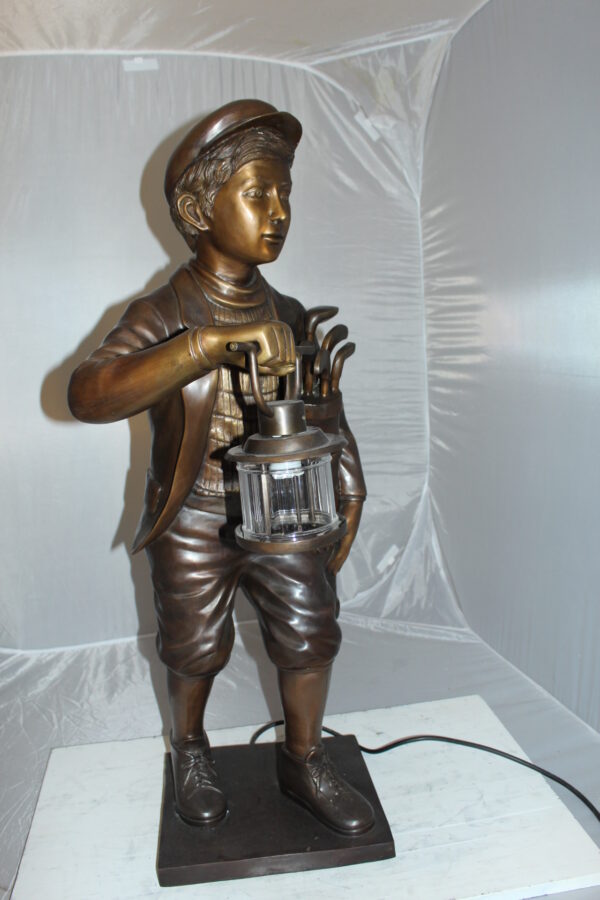 Caddy with light Bronze Statue -  Size: 19"L x 19"W x 42"H.