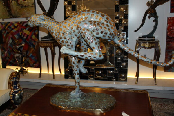 Running Cheetah - Gold Pleated Bronze Statue -  Size: 67"L x 23"W x 41"H.