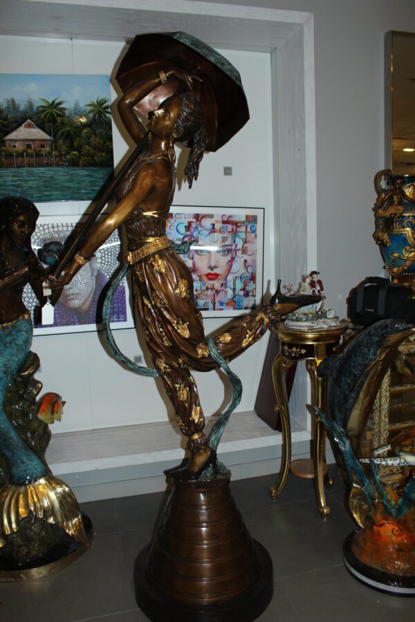 Dancer with umbrella - large Bronze Statue -  Size: 24"L x 42"W x 88"H.