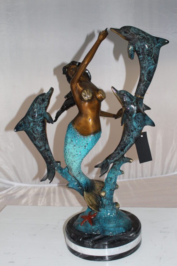 Mermaid with 3 dolphins Bronze Statue -  Size: 16"L x 10"W x 25"H.