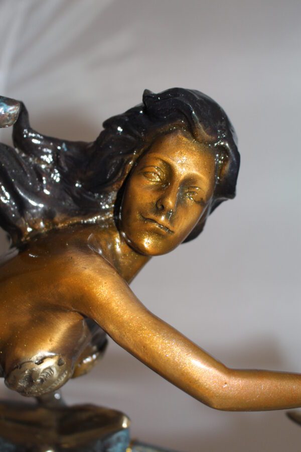 Mermaid with 3 dolphins Bronze Statue -  Size: 16"L x 10"W x 25"H.