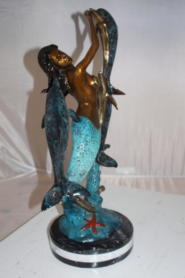 Mermaid with 3 dolphins Bronze Statue -  Size: 16"L x 10"W x 25"H.