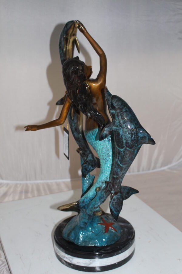 Mermaid with 3 dolphins Bronze Statue -  Size: 16"L x 10"W x 25"H.