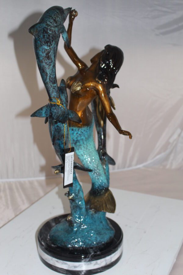 Mermaid with 3 dolphins Bronze Statue -  Size: 16"L x 10"W x 25"H.