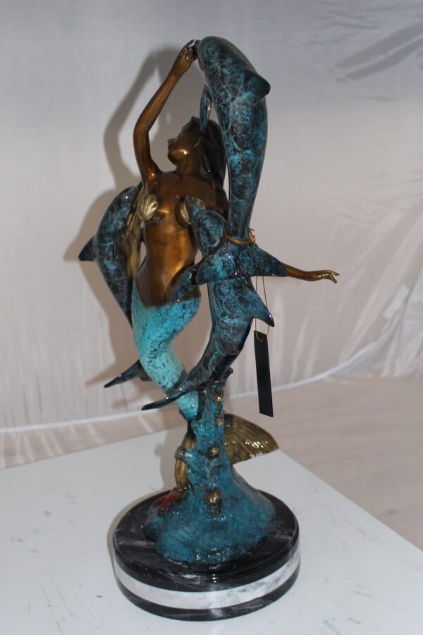 Mermaid with 3 dolphins Bronze Statue -  Size: 16"L x 10"W x 25"H.