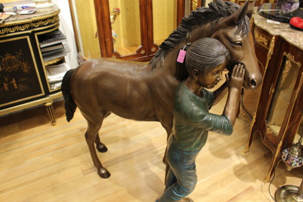 Young Girl and her pony Bronze Statue -  Size: 48"L x 20"W x 48"H.