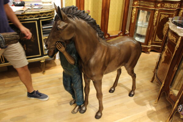 Young Girl and her pony Bronze Statue -  Size: 48"L x 20"W x 48"H.