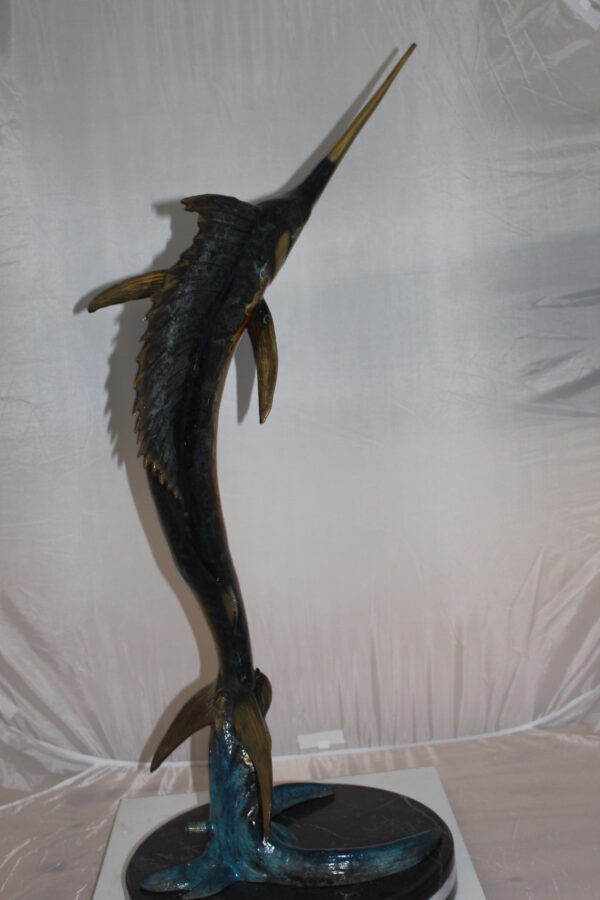 One Sailfish Bronze Statue -  Size: 18"L x 18"W x 43"H.