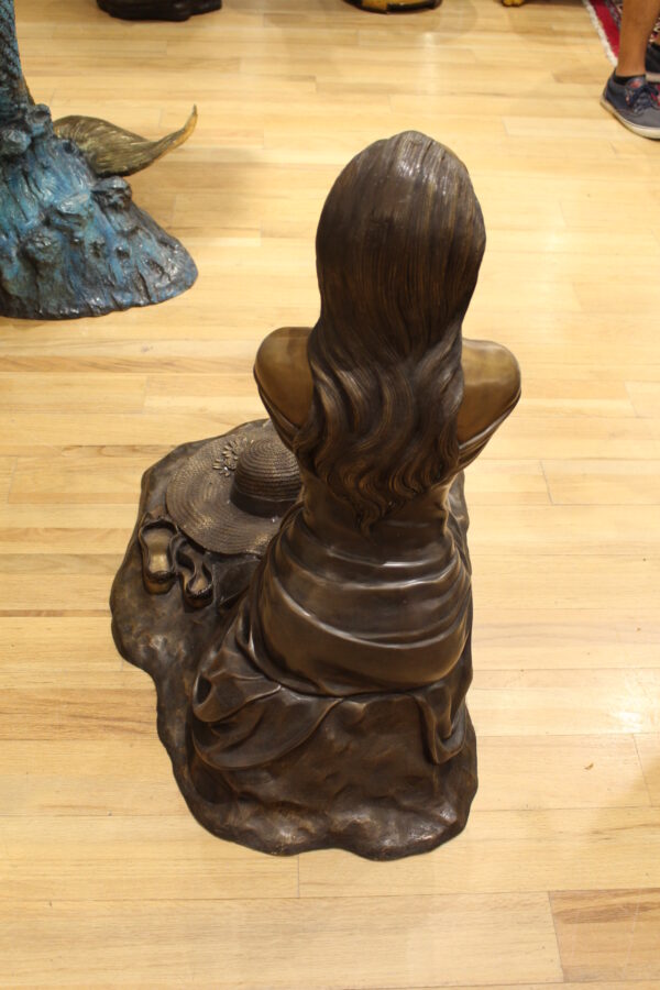 Lady on Stone Bronze Statue -  Size: 33"L x 23"W x 34"H.