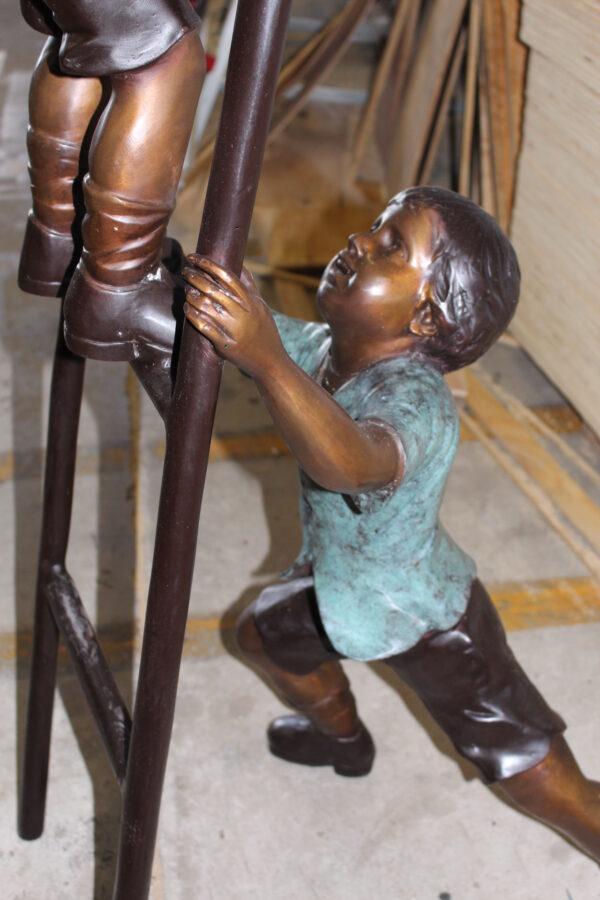 Three kids on a ladder Bronze Statue -  Size: 24"L x 22"W x 94"H.