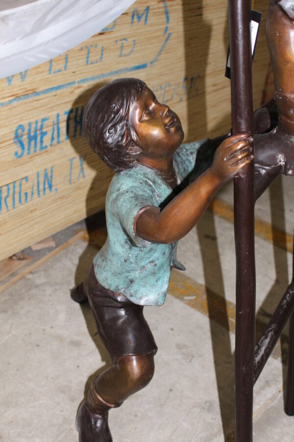 Three kids on a ladder Bronze Statue -  Size: 24"L x 22"W x 94"H.