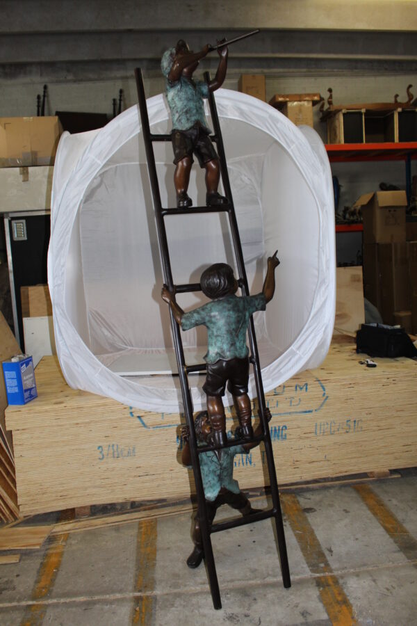 Three kids on a ladder Bronze Statue -  Size: 24"L x 22"W x 94"H.