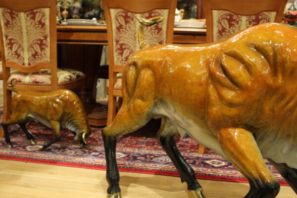 Bull Heads Down -Large Bronze Statue -  Size: 48"L x 12"W x 30"H.