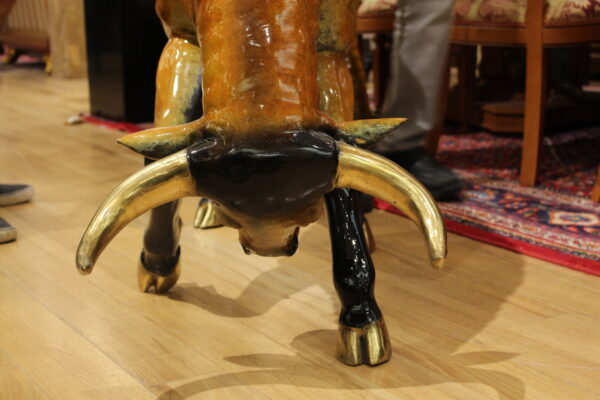 Bull Heads Down -Large Bronze Statue -  Size: 48"L x 12"W x 30"H.