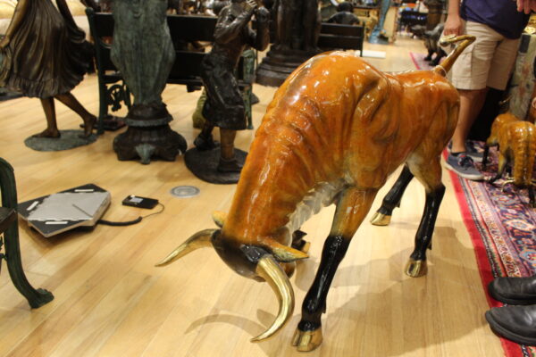 Bull Heads Down -Large Bronze Statue -  Size: 48"L x 12"W x 30"H.