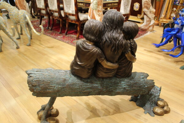 Three Children On Log Holding Bird Bronze Statue -  Size: 55"L x 18"W x 38"H.