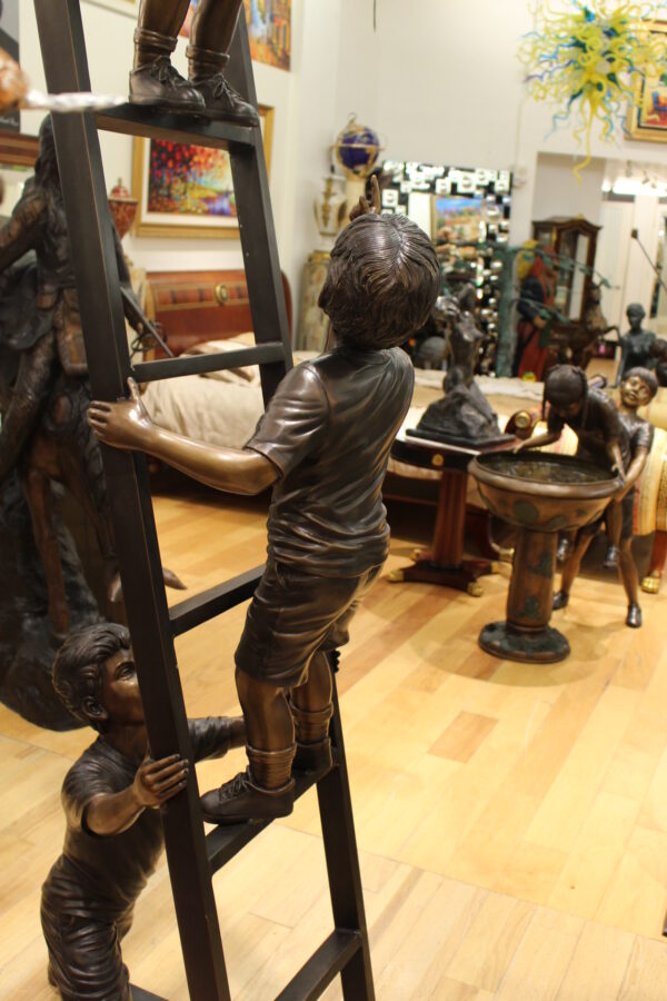 Three Children Playing on Ladder Bronze Statue -  Size: 24"L x 27"W x 96"H.