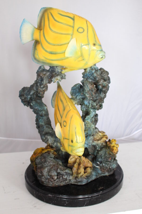 Two Butterfly fish swimming bronze statue -  Size: 12"L x 12"W x 24"H.