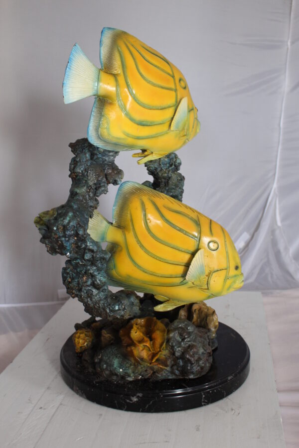 Two Butterfly fish swimming bronze statue -  Size: 12"L x 12"W x 24"H.