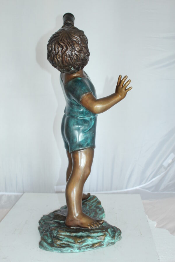 Boy with telescope Bronze Statue -  Size: 14"L x 10"W x 28"H.