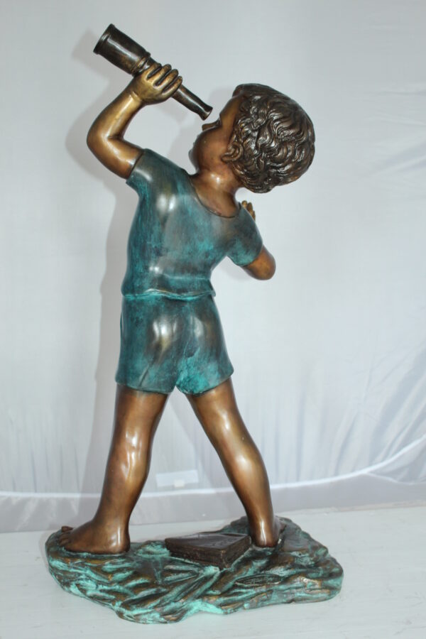 Boy with telescope Bronze Statue -  Size: 14"L x 10"W x 28"H.