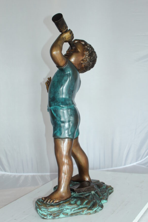 Boy with telescope Bronze Statue -  Size: 14"L x 10"W x 28"H.