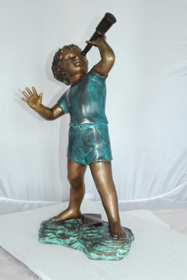 Boy with telescope Bronze Statue -  Size: 14"L x 10"W x 28"H.