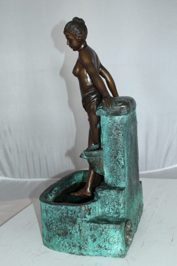 Lady on Wall fountain Bronze Statue -  Size: 12"L x 9"W x 21"H.