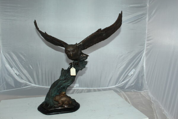 Owl with Rabbit Bronze Statue -  Size: 20"L x 8"W x 22"H.