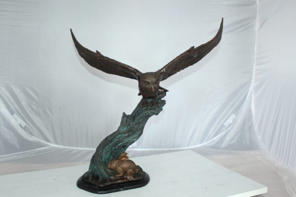 Owl with Rabbit Bronze Statue -  Size: 20"L x 8"W x 22"H.