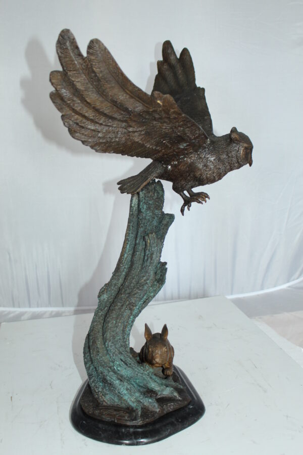 Owl with Rabbit Bronze Statue -  Size: 20"L x 8"W x 22"H.