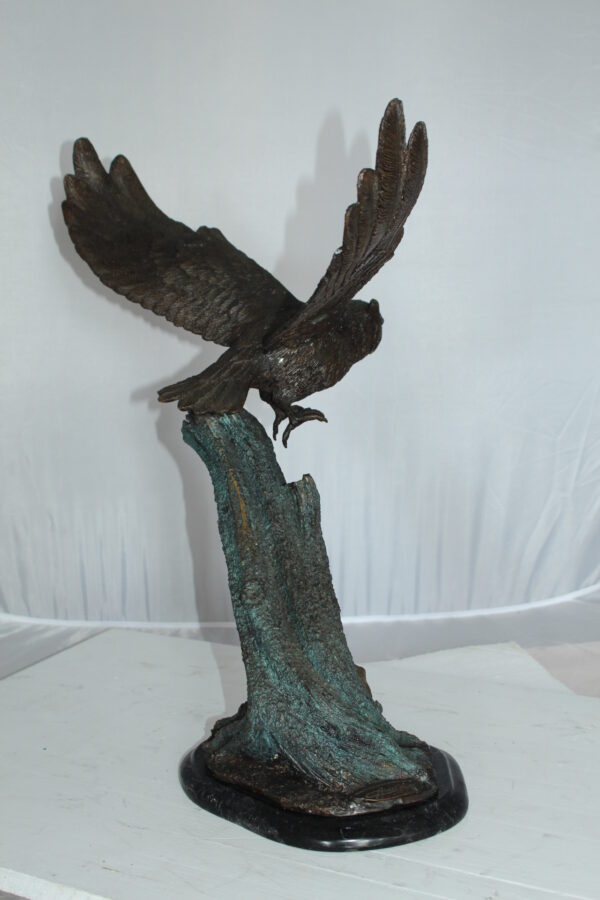 Owl with Rabbit Bronze Statue -  Size: 20"L x 8"W x 22"H.