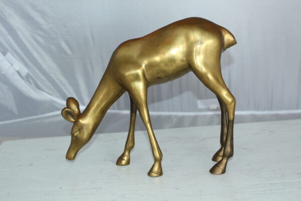 Two Tone color deer bronze statue -  Size: 13"L x 4"W x 11"H.