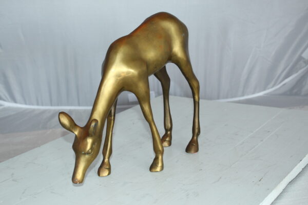 Two Tone color deer bronze statue -  Size: 13"L x 4"W x 11"H.