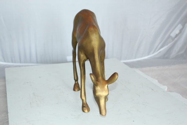 Two Tone color deer bronze statue -  Size: 13"L x 4"W x 11"H.