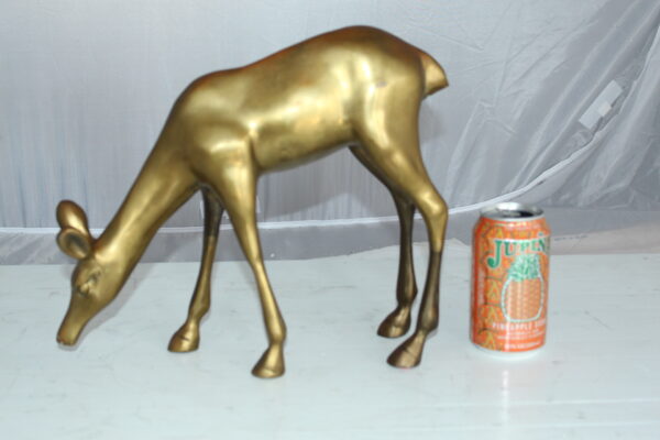 Two Tone color deer bronze statue -  Size: 13"L x 4"W x 11"H.