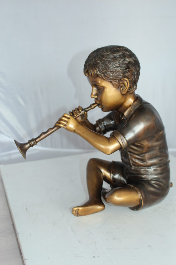 Boy with Flute fountain bronze statue -  Size: 7"L x 11"W x 14"H.