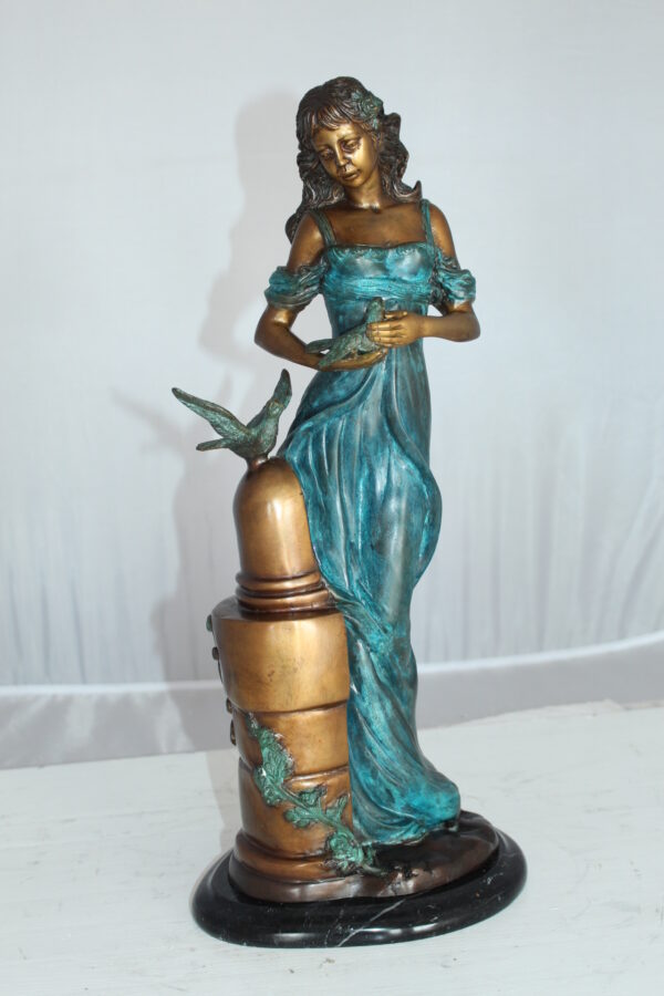 Girl with a Bird Bronze Statue -  Size: 7"L x 7"W x 18"H.