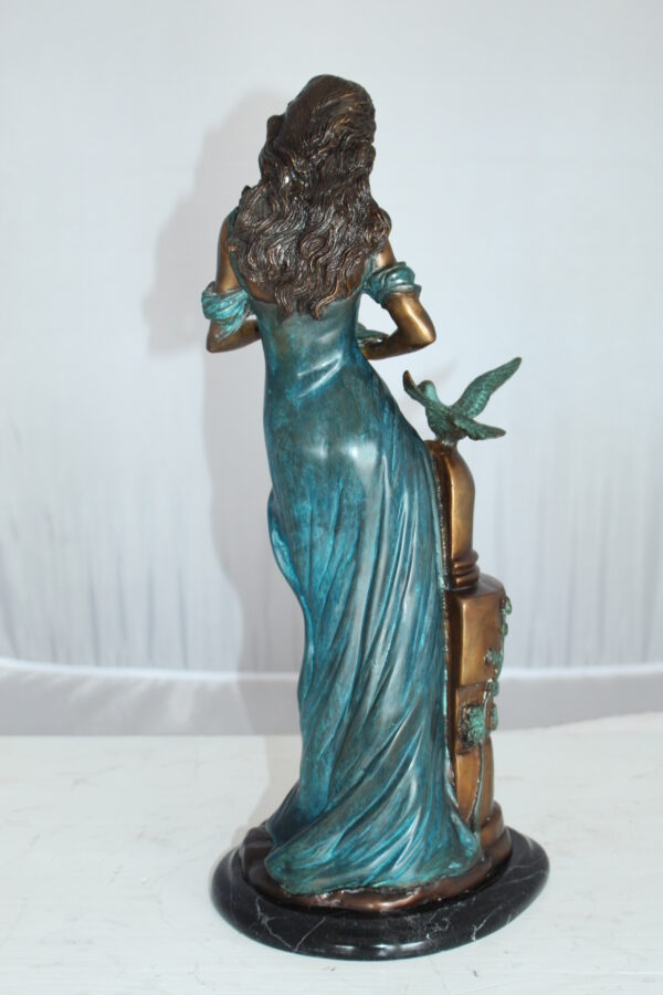 Girl with a Bird Bronze Statue -  Size: 7"L x 7"W x 18"H.