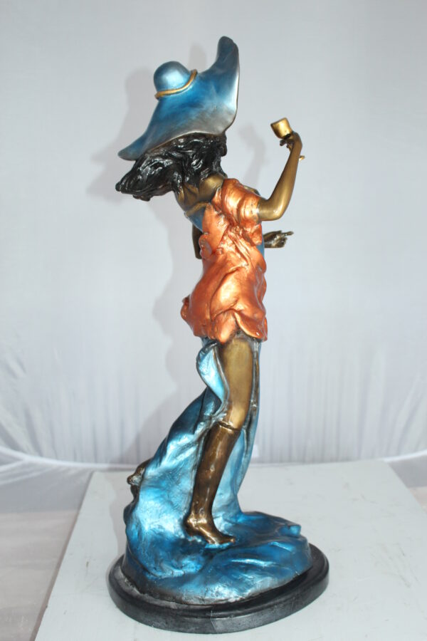 Lady Holding a Wine Glass Bronze Statue -  Size: 9"L x 11"W x 26"H.