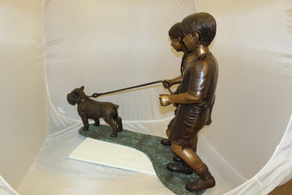 Two Kids Walking a dog Bronze Statue -  Size: 55"L x 28"W x 37"H.