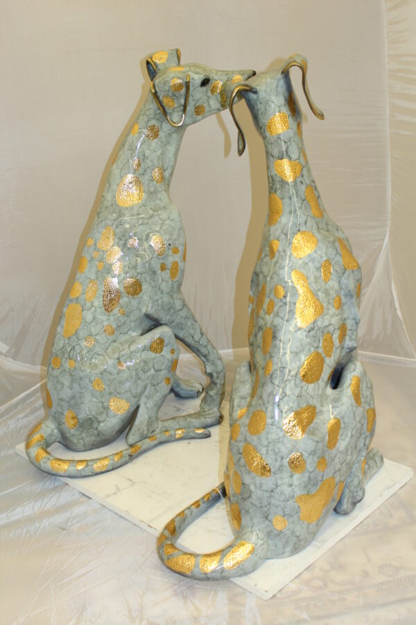 Pair of Golden Pleated Dalmatians Sitting Bronze Statue -  21"L x 16"W x 35"H.